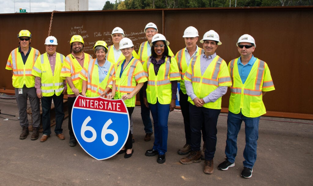 I-66 Project Leadership and Local Stakeholders gather to commemorate the setting of the last beam at the I-66/Route 28 interchange.