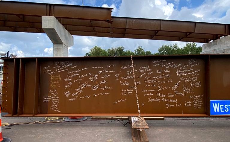 Beam signing ceremony at Transform 66 Outside the Beltway project